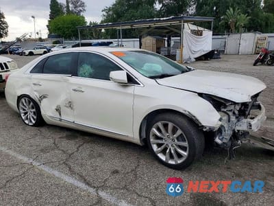 Czwarte zdjęcie samochodu z boku: 2015 CADILLAC XTS LUXURY COLLECTION VIN:2G61M5S39F9232174 - miniatura