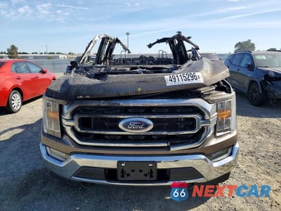 Piąte zdjęcie samochodu w środku: 2022 FORD F150 SUPERCREW VIN:1FTFW1E80NFA86508 - miniatura