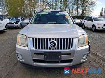 Piąte zdjęcie samochodu w środku: 2010 MERCURY MARINER PREMIER VIN:4M2CN8H76AKJ20755 - miniatura