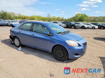 Czwarte zdjęcie samochodu z boku: 2010 TOYOTA YARIS BASE VIN:JTDBT4K34A4069217 - miniatura