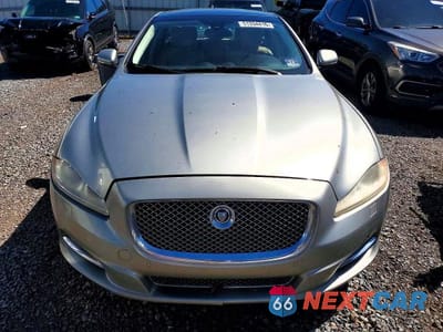 Piąte zdjęcie samochodu w środku: 2013 JAGUAR XJL PORTFOLIO VIN:SAJWJ2GD4D8V51942 - miniatura