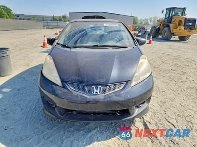 Piąte zdjęcie samochodu w środku: 2009 HONDA FIT VIN:JHMGE874X9S025642 - miniatura