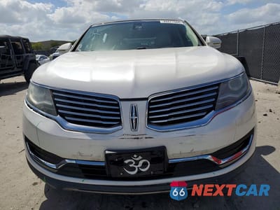 Piąte zdjęcie samochodu w środku: 2016 LINCOLN MKX RESERVE VIN:2LMTJ8LR2GBL66117 - miniatura