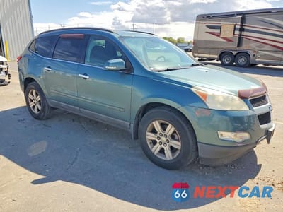 Czwarte zdjęcie samochodu z boku: 2009 CHEV TRAVERSE VIN:1GNER23D39S168262 - miniatura