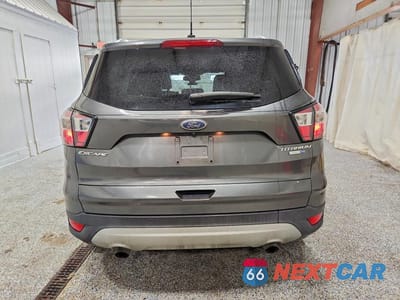 Zdjęcie 6 z 13 samochodu: 2017 FORD ESCAPE TITANIUM VIN:1FMCU9J9XHUC57797 - miniatura
