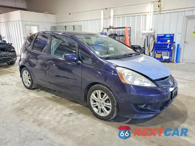 Czwarte zdjęcie samochodu z boku: 2010 HONDA FIT SPORT VIN:JHMGE8H47AC029385 - miniatura