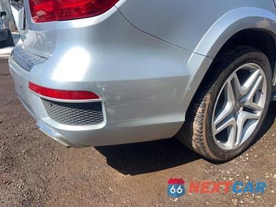 Zdjęcie 12 z 13 samochodu: 2013 MERCEDES-BENZ GL 550 4MATIC VIN:4JGDF7DE8DA124091 - miniatura