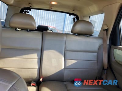 Zdjęcie 10 z 13 samochodu: 2004 FORD ESCAPE LIMITED VIN:1FMCU94164KB68904 - miniatura