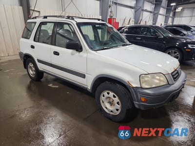 Czwarte zdjęcie samochodu z boku: 1999 HONDA CR-V LX VIN:JHLRD1840XC033391 - miniatura