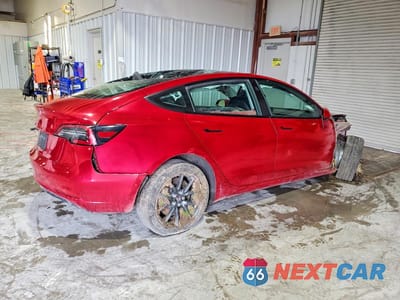Trzecie zdjęcie samochodu z tyłu: 2022 TESLA MODEL 3 VIN:5YJ3E1EA9NF185390 - miniatura