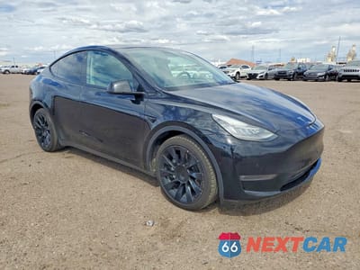 Czwarte zdjęcie samochodu z boku: 2022 TESLA MODEL Y VIN:7SAYGDEEXNF480201 - miniatura