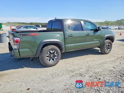 Trzecie zdjęcie samochodu z tyłu: 2022 TOYOTA TACOMA TRD OFF-ROAD VIN:3TMCZ5AN4NM490571 - miniatura