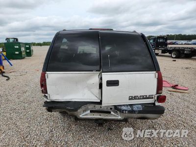 Zdjęcie 6 z 14 samochodu: 1999 CHEVROLET SUBURBAN C1500 VIN:3GNEC16R0XG247041 - miniatura