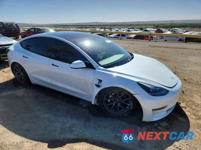 Czwarte zdjęcie samochodu z boku: 2021 TESLA MODEL 3 VIN:5YJ3E1EA9MF096742 - miniatura