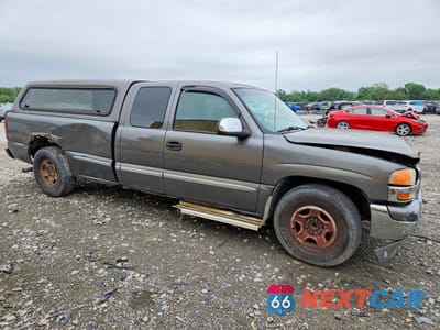 Czwarte zdjęcie samochodu z boku: 2001 GMC NEW SIERRA C1500 VIN:1GTEC19T61E185398 - miniatura