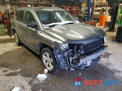 Czwarte zdjęcie samochodu z boku: 2012 JEEP COMPASS NORTH 4DR 4W VIN:1C4NJDAB7CD671236 - miniatura