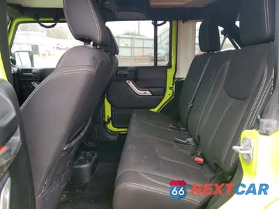 Zdjęcie 11 z 13 samochodu: 2016 JEEP WRANGLER UNLIMITED SAHARA VIN:1C4BJWEG3GL292346 - miniatura