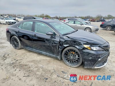 Czwarte zdjęcie samochodu z boku: 2023 TOYOTA CAMRY HYBRID XSE VIN:4T1K31AK0PU612137 - miniatura