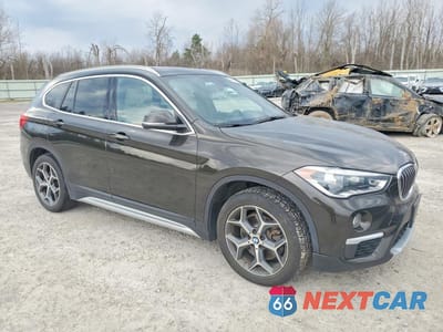 Czwarte zdjęcie samochodu z boku: 2018 BMW X1 XDRIVE28I VIN:WBXHT3C34J3H32543 - miniatura