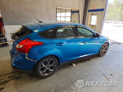 Trzecie zdjęcie samochodu z tyłu: 2014 FORD FOCUS SE VIN:1FADP3K29EL234100 - miniatura