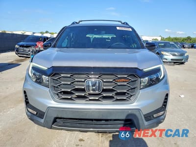 Piąte zdjęcie samochodu w środku: 2022 HONDA PASSPORT TRAIL SPORT VIN:5FNYF8H65NB005096 - miniatura