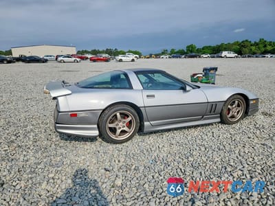 Trzecie zdjęcie samochodu z tyłu: 1985 CHEVROLET CORVETTE VIN:1G1YY0789F5100724 - miniatura