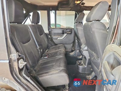 Zdjęcie 10 z 12 samochodu: 2015 JEEP WRANGLER UNLIMITED SAHARA VIN:1C4BJWEG2FL647330 - miniatura