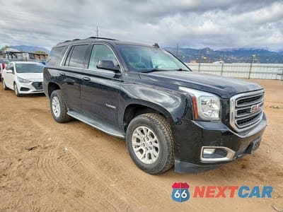 Czwarte zdjęcie samochodu z boku: 2020 GMC YUKON SLE VIN:1GKS2AKC5LR123345 - miniatura