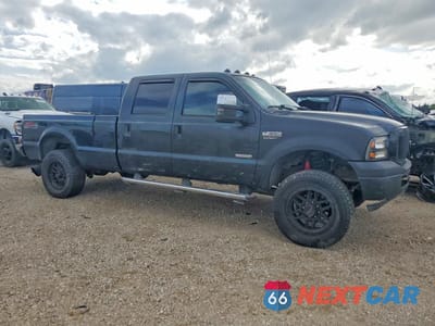 Czwarte zdjęcie samochodu z boku: 2005 FORD F350 SRW SUPER DUTY VIN:1FTWW31P05EC76842 - miniatura