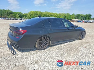 Trzecie zdjęcie samochodu z tyłu: 2017 BMW 750 I VIN:WBA7F0C32HGM22242 - miniatura