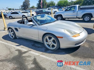 Czwarte zdjęcie samochodu z boku: 1999 PORSCHE BOXSTER VIN:WP0CA2986XU632387 - miniatura