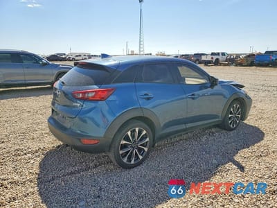 Trzecie zdjęcie samochodu z tyłu: 2019 MAZDA CX-3 TOURING VIN:JM1DKDC74K1456639 - miniatura