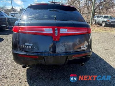 Zdjęcie 7 z 13 samochodu: 2013 LINCOLN MKT VIN:2LMHJ5NKXDBL53079 - miniatura