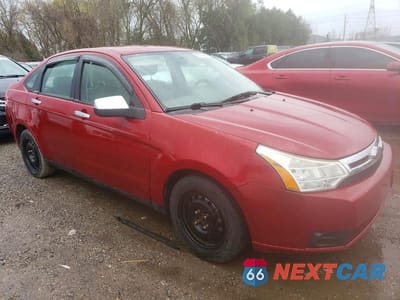 Czwarte zdjęcie samochodu z boku: 2009 FORD FOCUS SE VIN:1FAHP35N89W136820 - miniatura