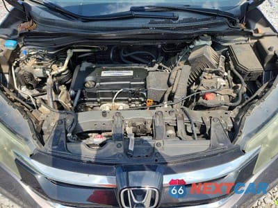 Zdjęcie 12 z 13 samochodu: 2015 HONDA CR-V EXL VIN:2HKRM3H72FH525734 - miniatura