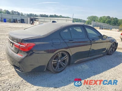 Trzecie zdjęcie samochodu z tyłu: 2018 BMW 750 XI VIN:WBA7B0C55JG527229 - miniatura