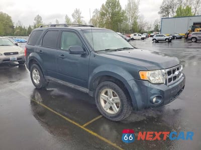 Czwarte zdjęcie samochodu z boku: 2011 FORD ESCAPE HYBRID VIN:1FMCU4K35BKC48148 - miniatura