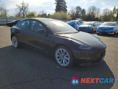 Czwarte zdjęcie samochodu z boku: 2022 TESLA MODEL 3 VIN:5YJ3E1EA5NF370942 - miniatura