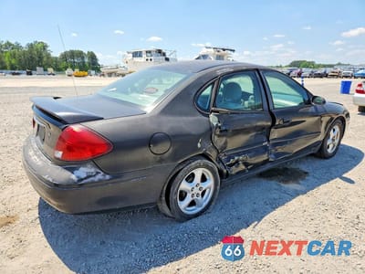 Trzecie zdjęcie samochodu z tyłu: 2003 FORD TAURUS VIN:1FAFP53U03A210863 - miniatura