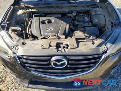 Zdjęcie 11 z 12 samochodu: 2016 MAZDA CX-5 GT VIN:JM3KE2DY7G0805937 - miniatura