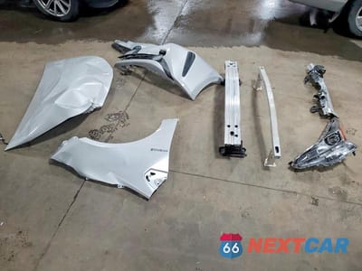 Zdjęcie 12 z 13 samochodu: 2021 TOYOTA PRIUS L ECO VIN:JTDKAMFU3M3143438 - miniatura