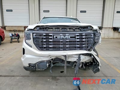 Piąte zdjęcie samochodu w środku: 2022 GMC SIERRA K1500 DENALI ULTIMATE VIN:1GTUUHETXNZ559971 - miniatura