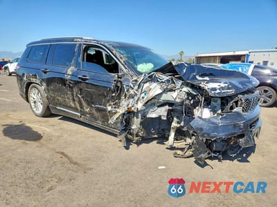 Czwarte zdjęcie samochodu z boku: 2021 JEEP GRAND CHEROKEE L SUMMIT VIN:1C4RJKEG8M8108069 - miniatura