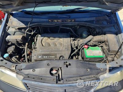 Zdjęcie 12 z 13 samochodu: 2001 HONDA ODYSSEY EX VIN:2HKRL187X1H544998 - miniatura
