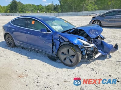Czwarte zdjęcie samochodu z boku: 2020 TESLA MODEL 3 VIN:5YJ3E1EB8LF711241 - miniatura