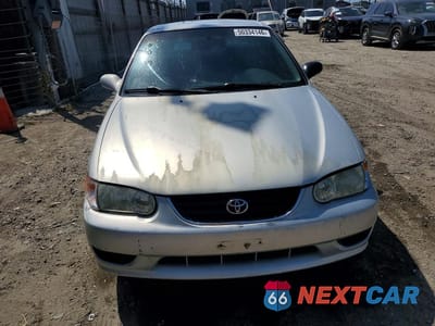 Piąte zdjęcie samochodu w środku: 2002 TOYOTA COROLLA LE VIN:1NXBR12E22Z613404 - miniatura