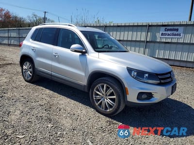 Czwarte zdjęcie samochodu z boku: 2015 VOLKSWAGEN TIGUAN S VIN:WVGBV7AX8FW585393 - miniatura