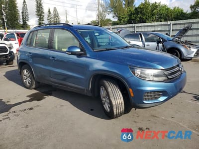 Czwarte zdjęcie samochodu z boku: 2017 VOLKSWAGEN TIGUAN S VIN:WVGAV7AX8HK037951 - miniatura