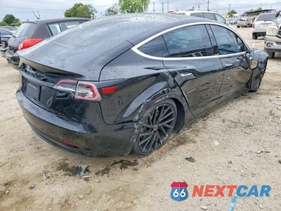 Trzecie zdjęcie samochodu z tyłu: 2020 TESLA MODEL 3 VIN:5YJ3E1EA5LF739148 - miniatura