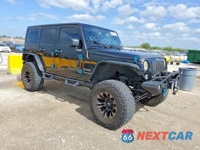 Czwarte zdjęcie samochodu z boku: 2018 JEEP WRANGLER UNLIMITED SPORT VIN:1C4HJWDG0JL882703 - miniatura